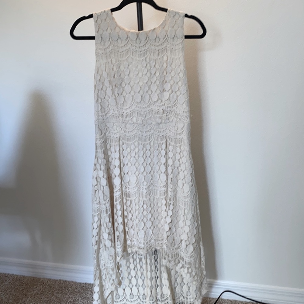 Detailed cream colored dress